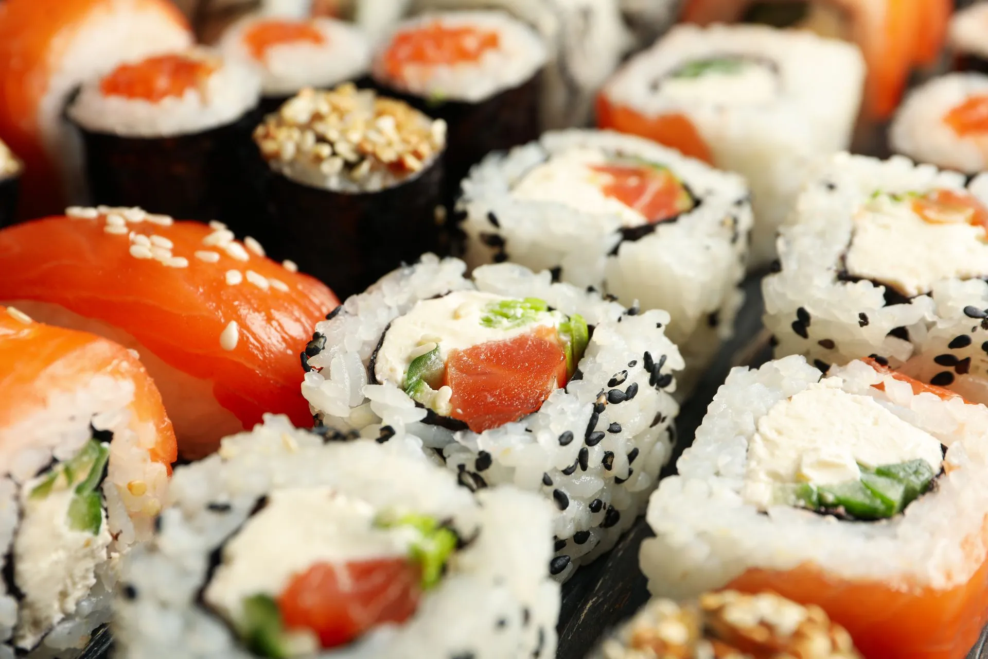 delicious-sushi-rolls-on-wooden